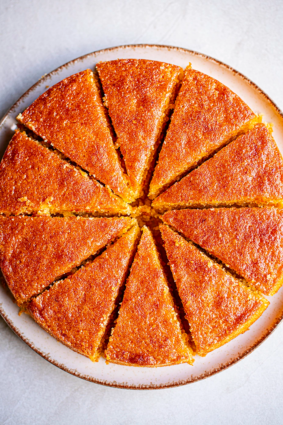 Person sitting by window working on tablet